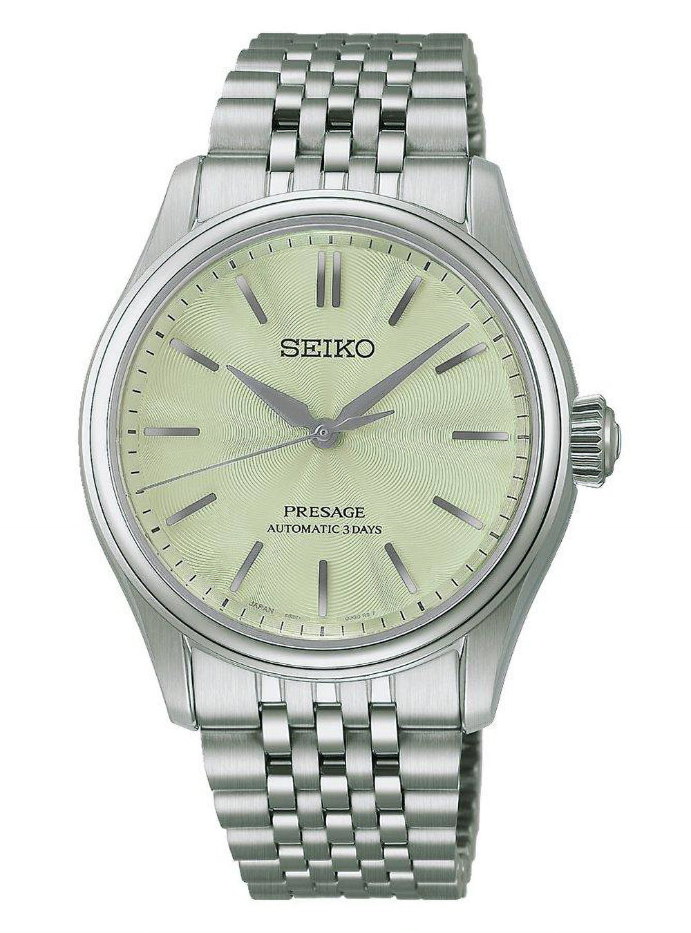 A Seiko Presage automatic watch with a silver stainless steel case and link bracelet, featuring a pale yellow dial with silver-tone baton indices.