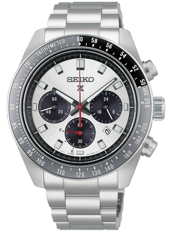 A Seiko stainless steel chronograph watch with a silver-tone metal link bracelet, a white dial, black subdials, and a black tachymeter bezel.