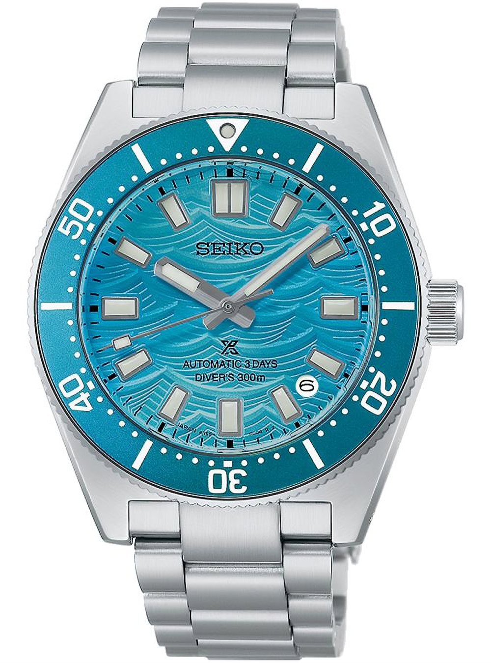 A Seiko dive watch with a silver stainless steel case and bracelet, featuring a vibrant turquoise blue dial with a wavy pattern and a matching blue bezel.