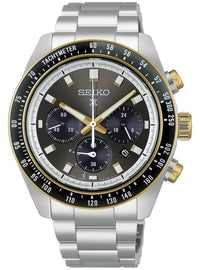 A Seiko stainless steel chronograph watch with a silver-tone metal link bracelet, a black dial with gold-tone hands and markers, and a black bezel with gold-tone markings.