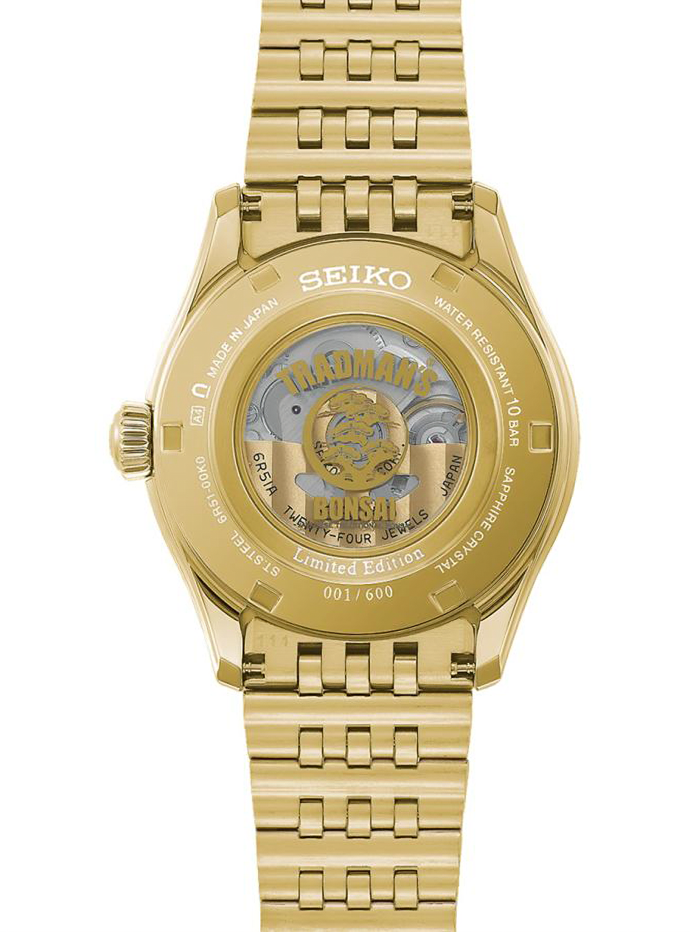 Gold-tone Seiko Sunburst watch with a transparent case back showing the mechanical movement and gold-tone internal details, set against a plain white background.