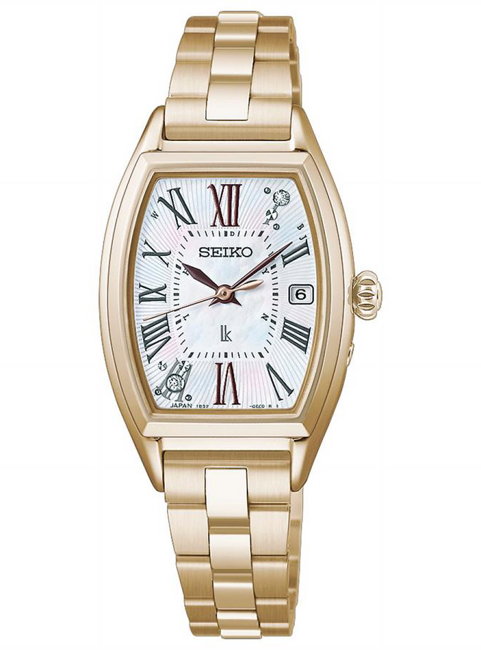 The dial features delicate Roman numeral hour markers, with lab-grown diamonds set at the 1 o'clock and 7 o'clock positions.