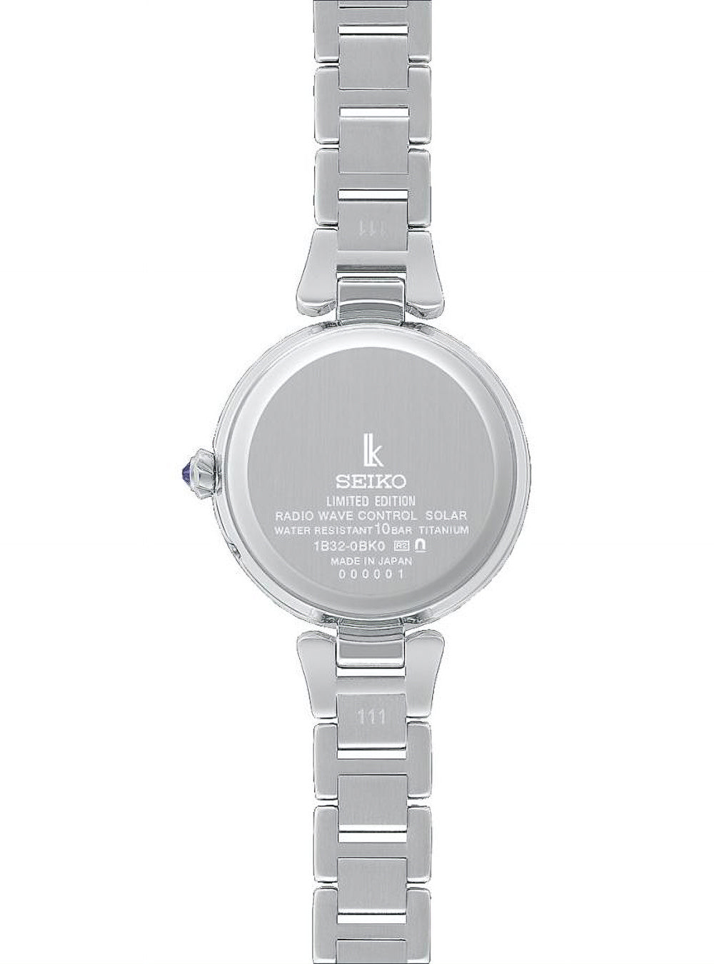 The back of a silver Seiko women's watch with a titanium link bracelet, featuring a round case with engraved details and a crown adjustment knob on a white background.