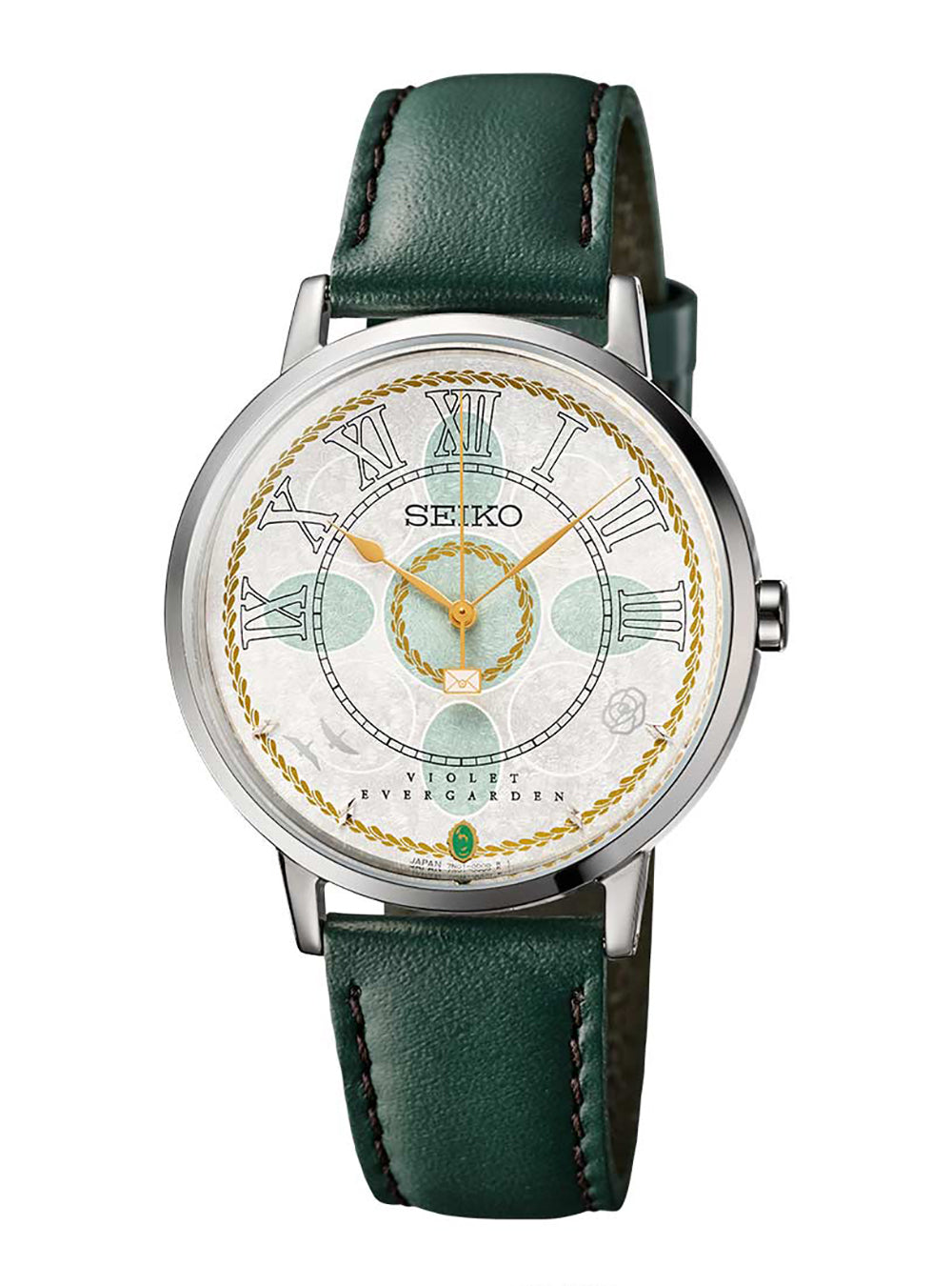 A Seiko wristwatch with a dark green leather strap, a silver-toned round case, and a white dial featuring Roman numerals, gold hands, and mint green and gold decorative details.