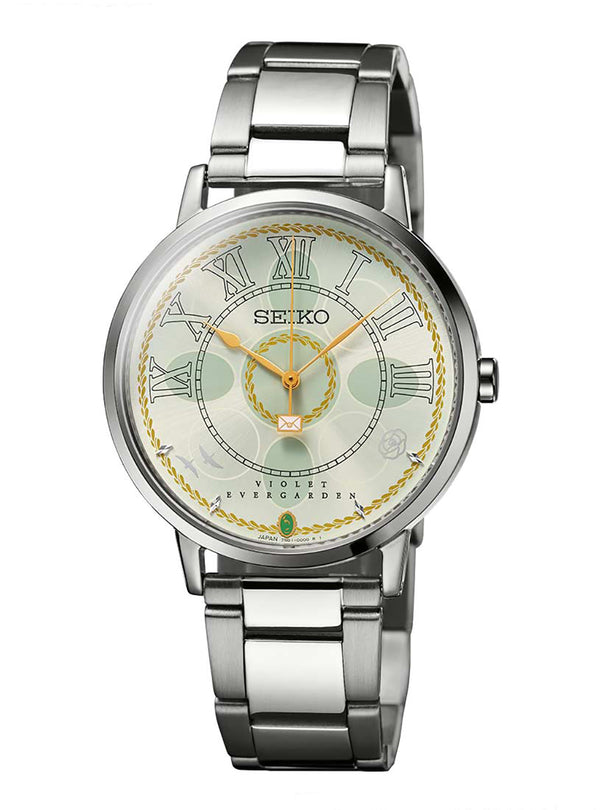 A Seiko women's watch featuring a silver stainless steel link bracelet, a round silver case, and a unique dial with a cream background, Roman numeral hour markers, gold hands, and a decorative gold rope border.