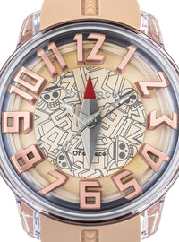 A close-up of a Oneok Oneok watch featuring a beige silicone strap, a clear case, rose gold-tone numerals, and a detailed graphic dial with a compass rose and skull motifs.